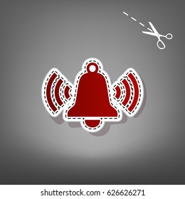 Ringing bell icon. Vector. Red icon with for applique from paper with shadow on gray background with scissors.