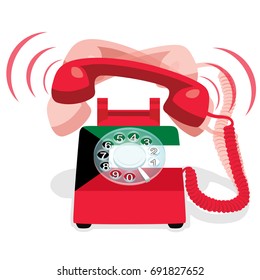 Ringing red stationary phone with rotary dial and with flag of  Kuwait