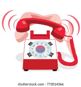 Ringing red stationary phone with rotary dial and with flag of South Korea