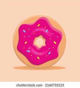 Ring-shaped donut covered with pink strawberry-flavored glaze