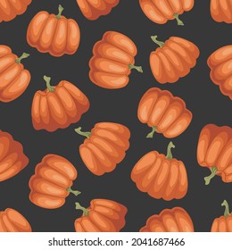 Calabazas naranjas maduras en un fondo gris. Otoño, verduras. Patrón de comida sin fideos. Adecuado para el embalaje, textil, diseño de menú.