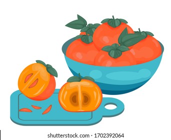 
ripe persimmon cut on a board and a set of fruits in a plate