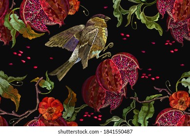 Ripened pomegranate fruits, birds and wild roses flowers. Horizontal seamless pattern. Embroidery. Autumn garden art. Botanical background. Fashion template for clothes, t-shirt design, textile 