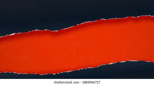 Ripped black paper revealing orange paper underneath. Banner background with text copyspace.