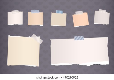 Ripped brown notebook, note paper stuck on dark gray background
