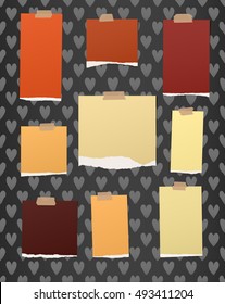 Ripped colorful notebook, note paper stuck with brown sticky tape on pattern created of heart shapes