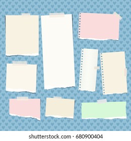 Ripped colorful, pastel note, notebook, copybook strips stuck with sticky tape on blue background created from heart shapes.