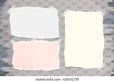 Ripped colorful, white notebook, copybook note paper stuck with sticky tape on pattern created of heart shapes