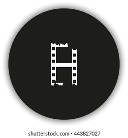 Ripped film strip. Celluloid icon.