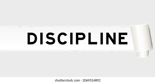 Ripped gray paper background that have word discipline under torn part