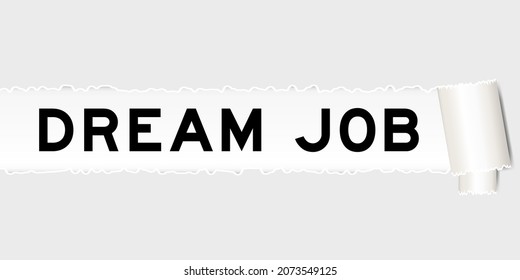 Ripped gray paper background that have word dream job under torn part