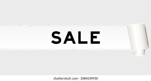 Ripped gray paper background that have word sale under torn part