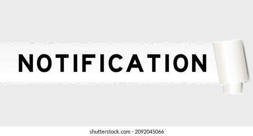 Ripped gray paper background that have word notification under torn part