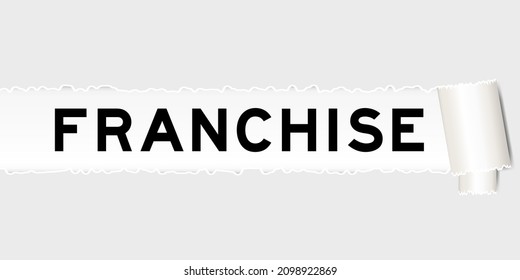 Ripped gray paper background that have word franchise under torn part