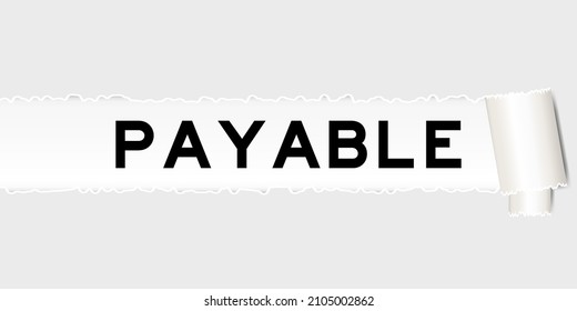 Ripped gray paper background that have word payable under torn part