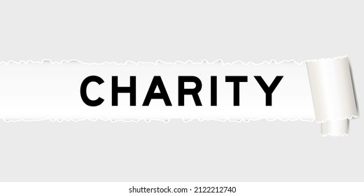 Ripped gray paper background that have word charity under torn part