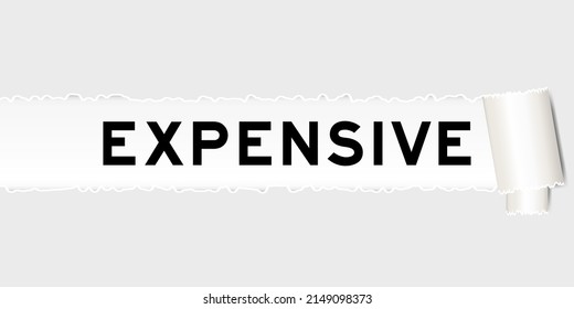 Ripped gray paper background that have word expensive under torn part