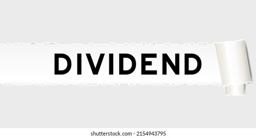 Ripped gray paper background that have word dividend under torn part