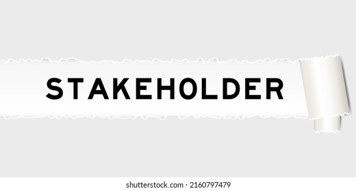  Ripped gray paper background that have word stakeholder under torn part