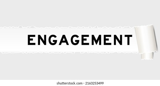 Ripped gray paper background that have word engagement under torn part