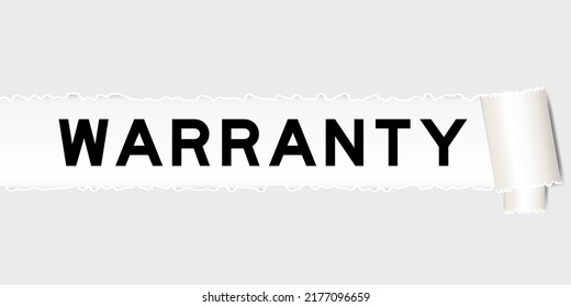 Ripped gray paper background that have word warranty under torn part