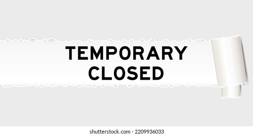 Ripped gray paper background that have word temporary closed under torn part