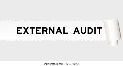 Ripped gray paper background that have word external audit under torn part