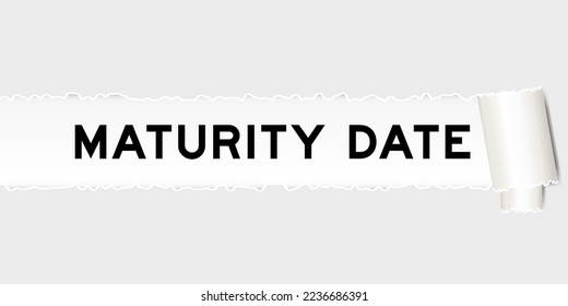 Ripped gray paper background that have word maturity date under torn part