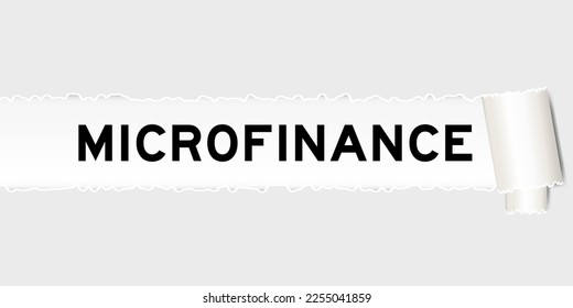 Ripped gray paper background that have word microfinance under torn part