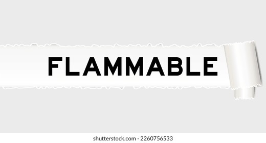 Ripped gray paper background that have word flammable under torn part