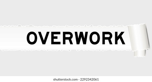 Ripped gray paper background that have word overwork under torn part