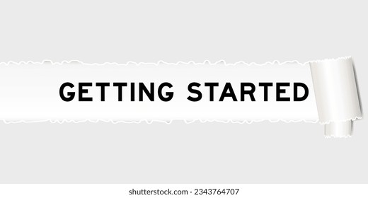 Ripped gray paper background that have word getting started under torn part