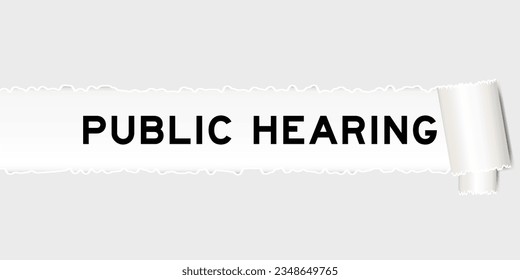 Ripped gray paper background that have word public hearing under torn part
