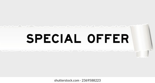 Ripped gray paper background that have word special offer under torn part