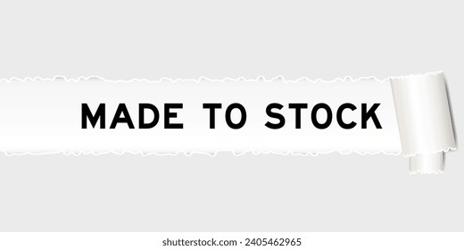Ripped gray paper background that have word made to stock under torn part