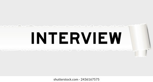 Ripped gray paper background that have word interview under torn part