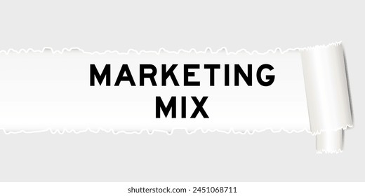 Ripped gray paper background that have word marketing mix under torn part