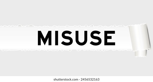 Ripped gray paper background that have word misuse under torn part