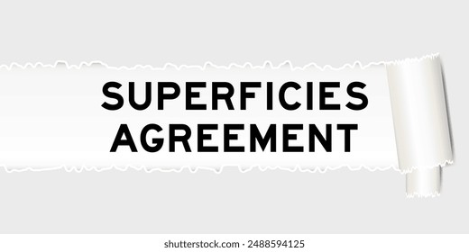 Ripped gray paper background that have word superficies agreement under torn part