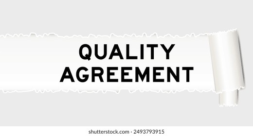 Ripped gray paper background that have word quality agreement under torn part
