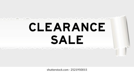 Ripped gray paper background that have word clearance sale under torn part