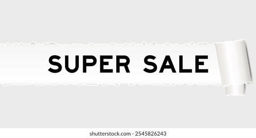 Ripped gray paper background that have word super sale under torn part