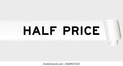 Ripped gray paper background that have word half price under torn part