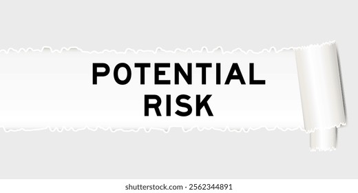 Ripped gray paper background that have word potential risk under torn part
