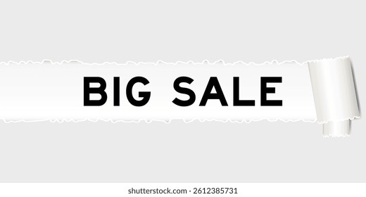 Ripped gray paper background that have word big sale under torn part