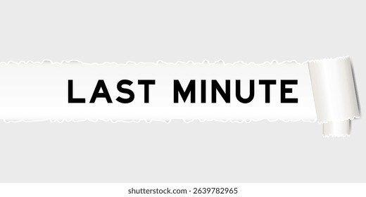 Ripped gray paper background that have word last minute under torn part