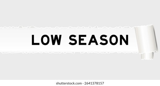 Ripped gray paper background that have word low season under torn part