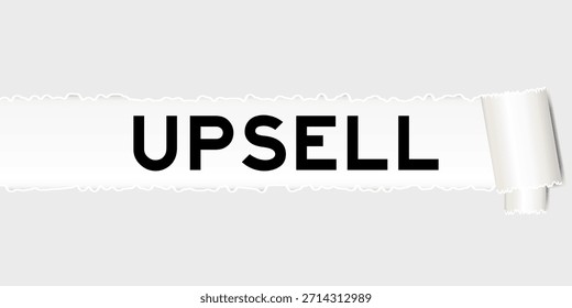 Fondo de papel gris rasgado que tiene la palabra upsell bajo la parte rasgada
