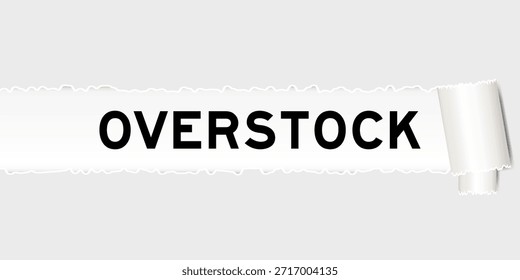 Ripped gray paper background that have word overstock under torn part