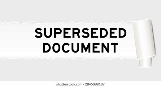 Ripped gray paper background that have word superseded document under torn part